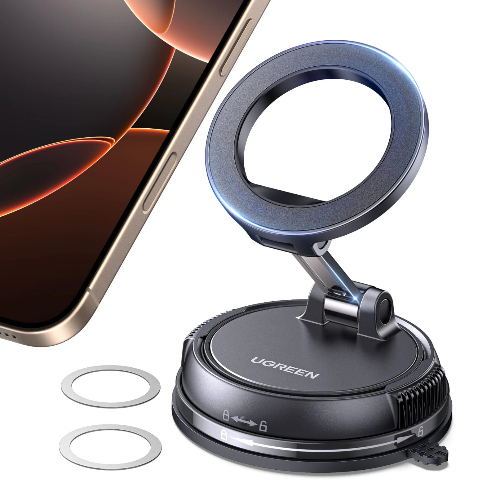 Phone holder with LED ring light on a black base, gold phone edge, and two metal rings nearby.